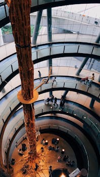 A stunning view of the spiral staircase inside CosmoCaixa, Barcelona's renowned science museum.